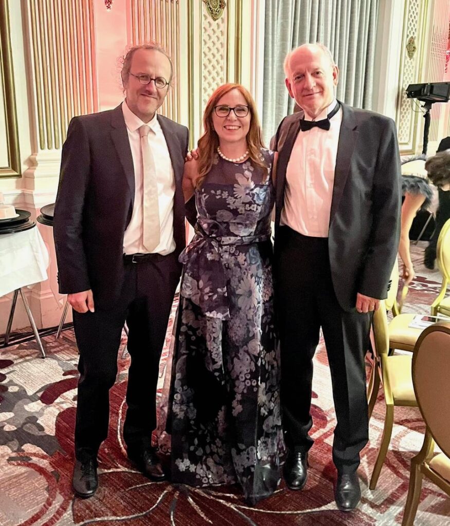 Bernhard Schölkopf (left) and Stuart J. Russell (right) pose with Francesca Rossi, AAAI President (center) at the 2023 ACM awards ceremony, where they were celebrated for receiving the 2022 ACM-AAAI Allen Newell Award